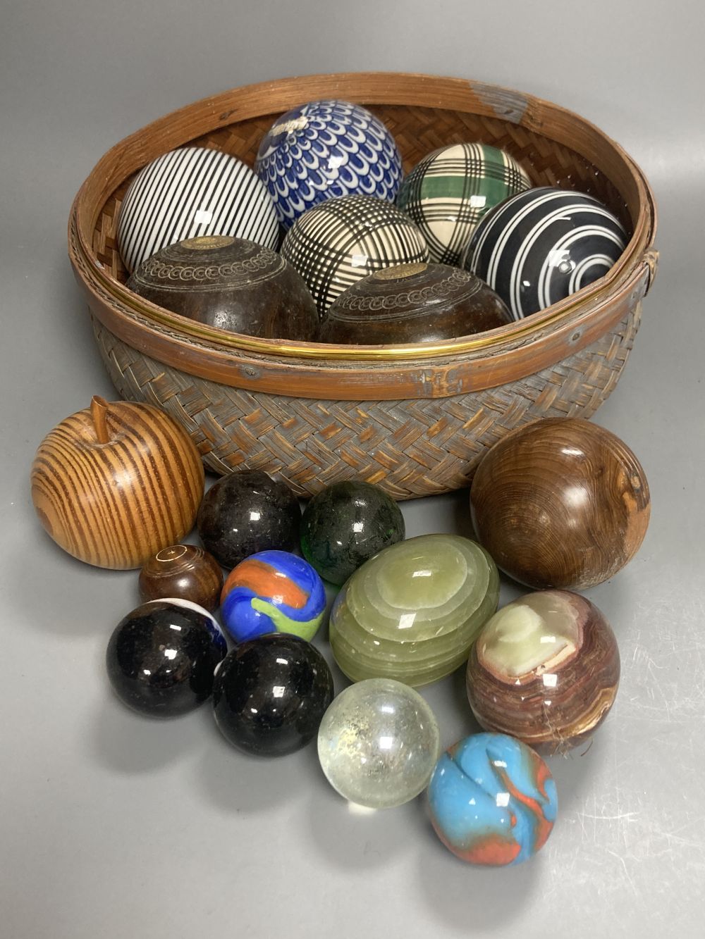 A collection of Scottish ceramic and other carpet bowls